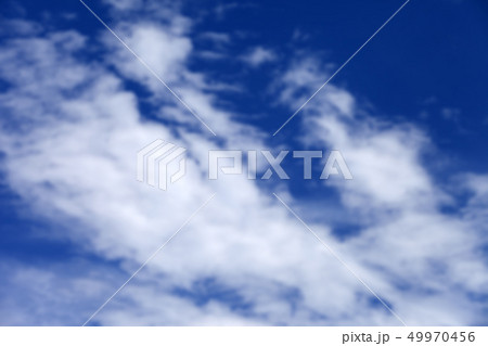 Blurred blue sky with clouds in sun summer day not 49970456