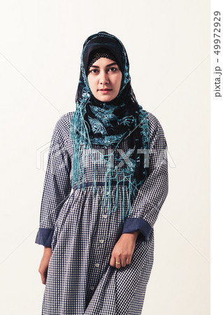 Portrait of Arabic woman in traditional clothes. Portrait of Arabic woman in traditional clothes. 49972929