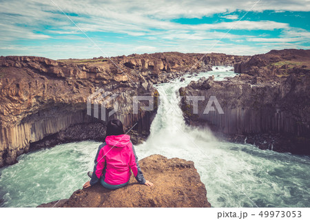 Hiking at Aldeyjarfoss Waterfall in Iceland. 49973053