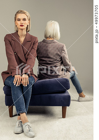 Beautiful attractive woman wearing a stylish jacket 49973705