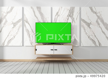 Smart Tv Mockup with blank green screen hanging  49975420