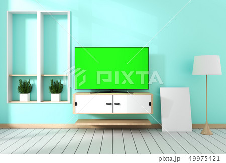 Smart Tv with blank green screen hanging  49975421