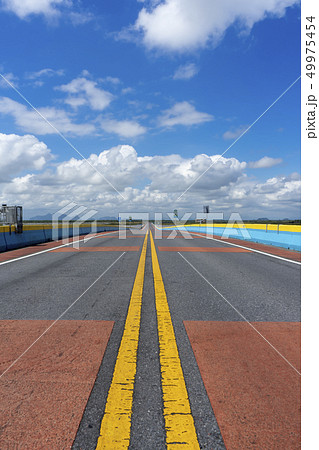 White cloud on the sky at Empty road. 49975454