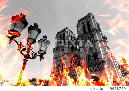 Notre Dame Cathedral burning by massive fire, representation. Notre-Dame de Paris in fire. Photo 49978749
