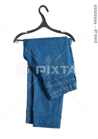 hanger with jeans on white 49980089