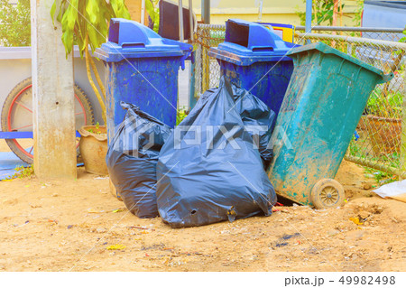 pile black garbage bag plastic and four dustbin pile black garbage bag plastic and four dustbin 49982498