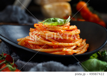 Spaghetti pasta with tomato sauce Spaghetti pasta with tomato sauce 49987422