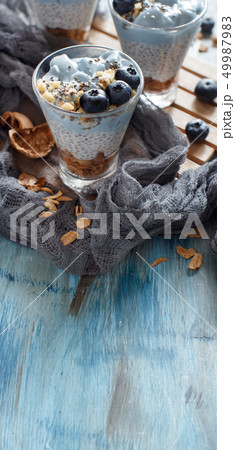 Blueberries and yogurt chia pudding parfait Blueberries and yogurt chia pudding parfait 49987983