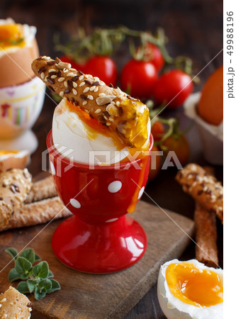 Soft-boiled egg with crisp bread Soft-boiled egg with crisp bread 49988196