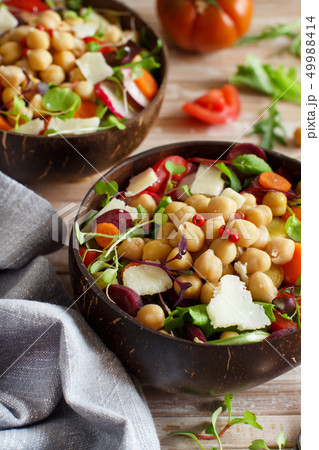 Chickpea salad with vegetables and microgreens Chickpea salad with vegetables and microgreens 49988414