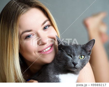 Beautiful blonde woman wake up early morning Beautiful blonde woman wake up early morning 49989217
