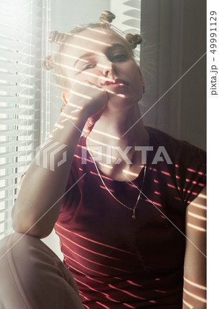 girl with curlers 49991129