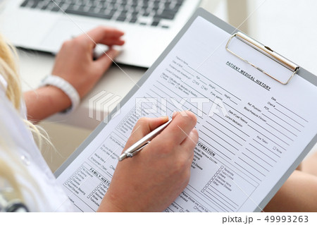 Female doctor hold clipboard pad 49993263