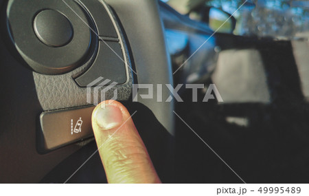 lane change assist system button on the steering wheel of car lane change assist system button on the steering wheel of car 49995489