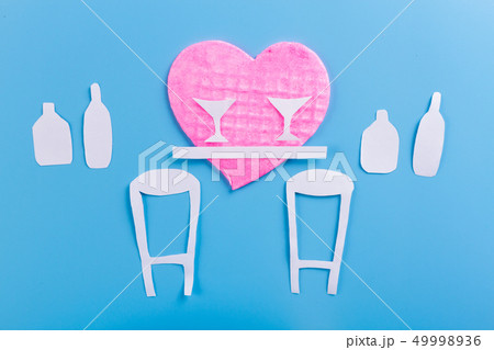 Bar counter with alcohol bottles assortment. 49998936