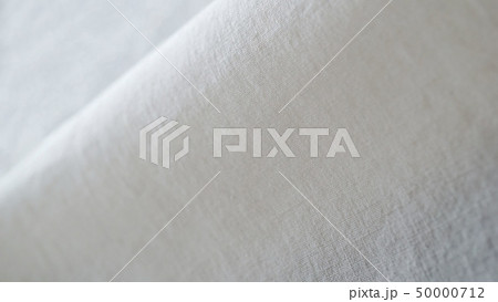 生地 布 白 麻 綿 素材 背景 イメージ しろ シロ ナチュラル 天然 自然 柔らかい アップ の写真素材