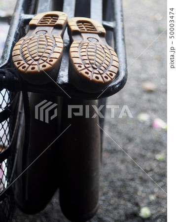 old used dirty rustic grunge black rubber boots 50003474