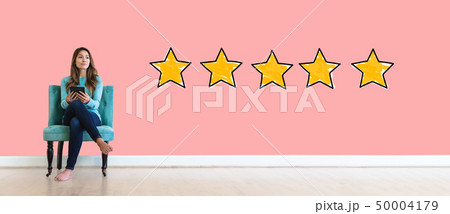 Five star rating with young woman Five star rating with young woman 50004179