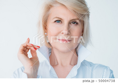 aged lady confidence elegance stylish index finger 50004738