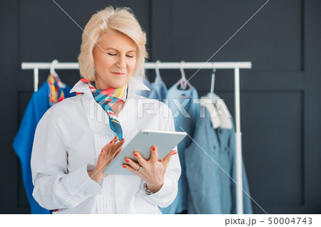 successful seniority lady tablet fashion business successful seniority lady tablet fashion business 50004743