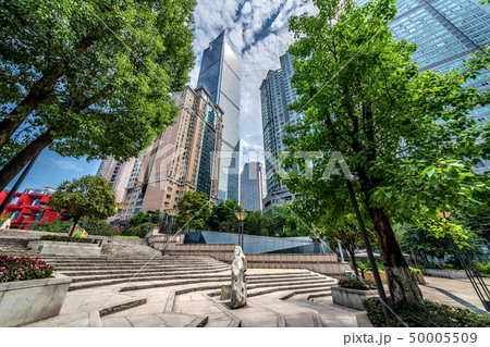 Modern skyscraper buildings and a city park Modern skyscraper buildings and a city park 50005509