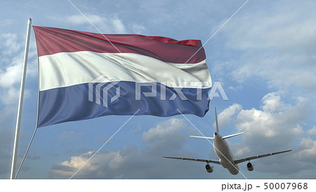 Airliner flying over waving flag of the Netherlands. 3D rendering 50007968