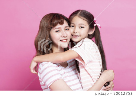 happy beautiful mother holding her child happy beautiful mother holding her child 50012753