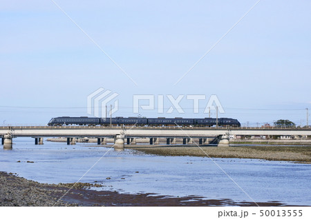 駅館川を渡る787系・特急にちりん 50013555
