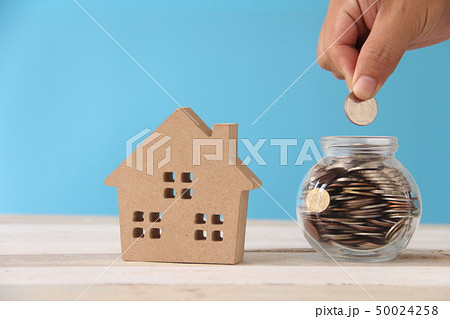 man put coin in bottle for buy new  50024258