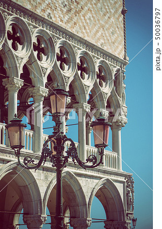 Detail of lamp and columns in Venice. Vertically. Detail of lamp and columns in Venice. Vertically. 50036797