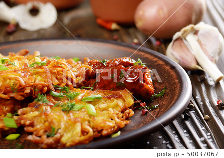 Closeup view at Homemade tasty potato pancakes in 50037067