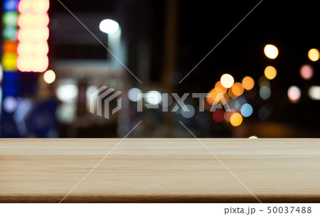 Selective Empty wooden table in front of abstract Selective Empty wooden table in front of abstract 50037488