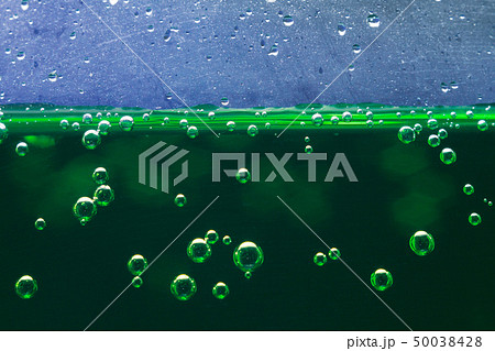 green background beverage close-up green background beverage close-up 50038428