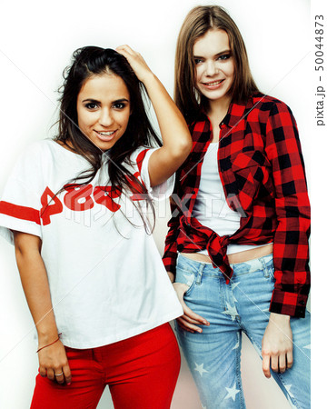 best friends teenage girls together having fun, posing emotional on white background, besties happy best friends teenage girls together having fun, posing emotional on white background, besties happy 50044873