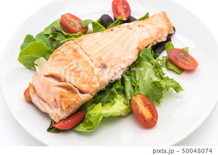 grilled salmon steak on white 50048074