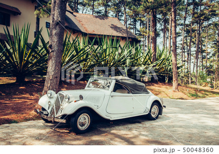 White vintage luxury classic convertible car at 50048360