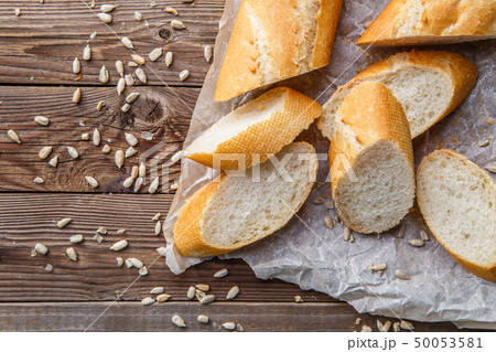 Loaf on table with seeds Loaf on table with seeds 50053581