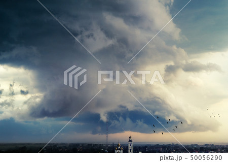 Sky before thunderstorm over the evening city 50056290