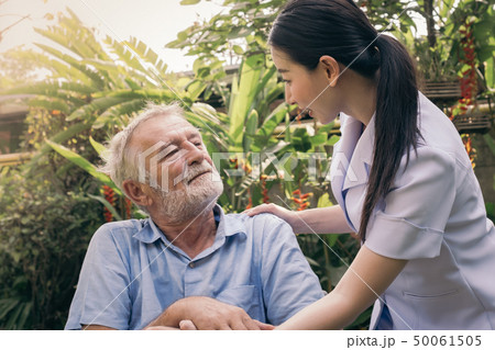 senior man happiness sitting on wheelchair with senior man happiness sitting on wheelchair with 50061505