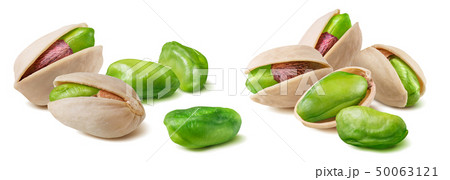 Double set of pistachio nuts isolated on white 50063121