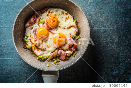 English breakfast fried bacon ham and eggs in 50065142
