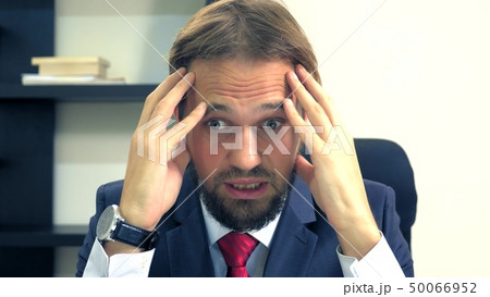 close-up, green-eyed handsome man wistfully looks around close-up, green-eyed handsome man wistfully looks around 50066952