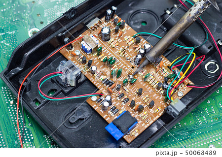 Technician repairing electronic of the computer 50068489