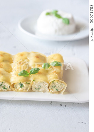 Cannelloni stuffed with ricotta Cannelloni stuffed with ricotta 50071708