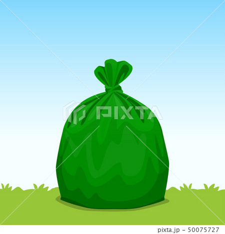 green bag plastic garbage on grass sky background 50075727