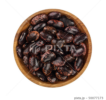 black kidney bean in wooden bowl isolated on white background. Top view. Flat lay black kidney bean in wooden bowl isolated on white background. Top view. Flat lay 50077173