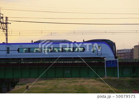 中央線多摩川橋梁を通過するE353系 50079575