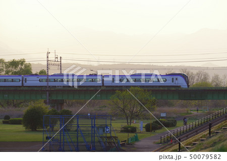 中央線多摩川橋梁を通過するE353系 50079582