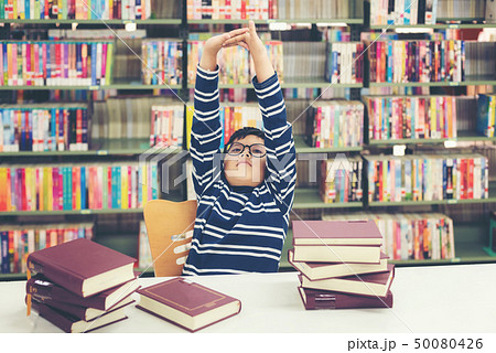 Kids asia boy reading books for education  50080426