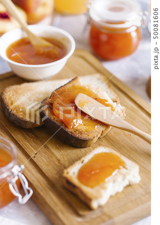 Apricot jam on toast Apricot jam on toast 50081606